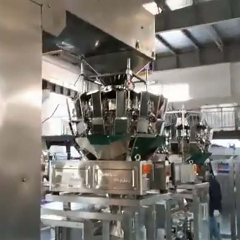 Machine de remplissage et d'emballage à grande vitesse pour céréales granulaires et riz